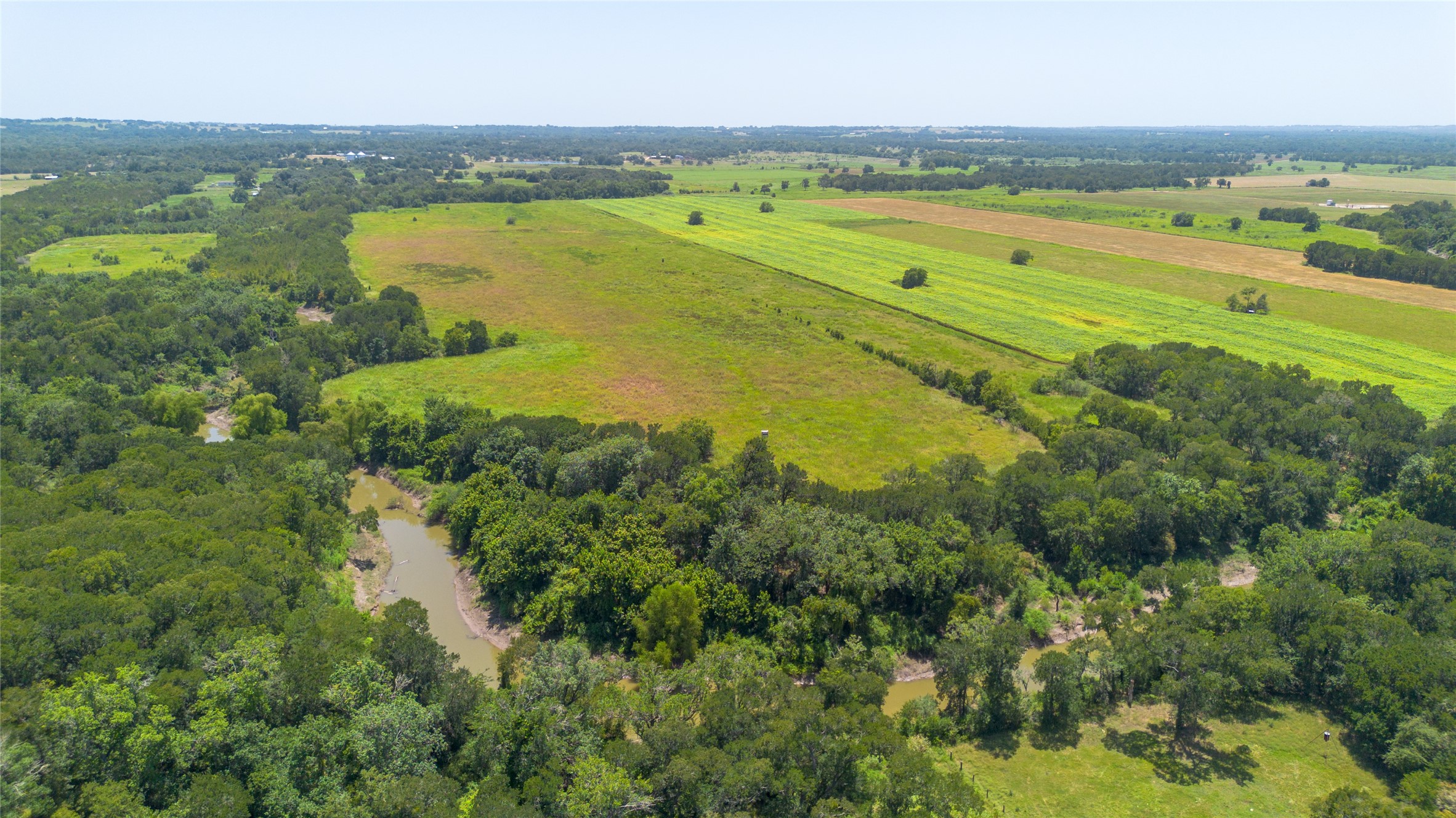 0 Devault Lane Brenham, TX 77833 - Photo 7 of 8 a view of a city and an ocean view