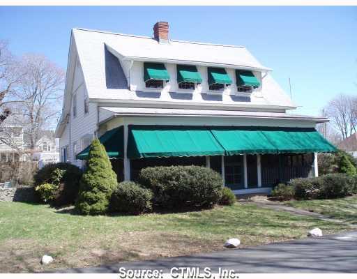 16 Blake Avenue Clinton, CT 06413 - Photo 1 of 1 a front view of a house with garden