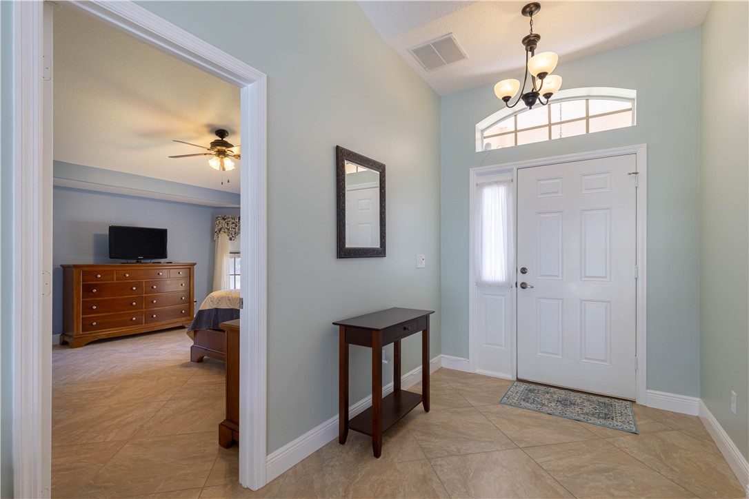 414 Ash Street Sebastian, FL 32958 - Photo 5 of 36 a view of a livingroom with a flat screen tv