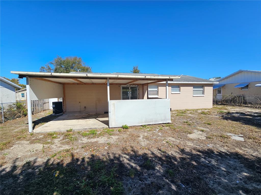 6324 Lomand Avenue New Port Richey, FL 34653 - Photo 15 of 16 a view of a house with a patio