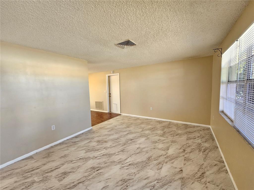 6324 Lomand Avenue New Port Richey, FL 34653 - Photo 2 of 16 a view of an empty room and window