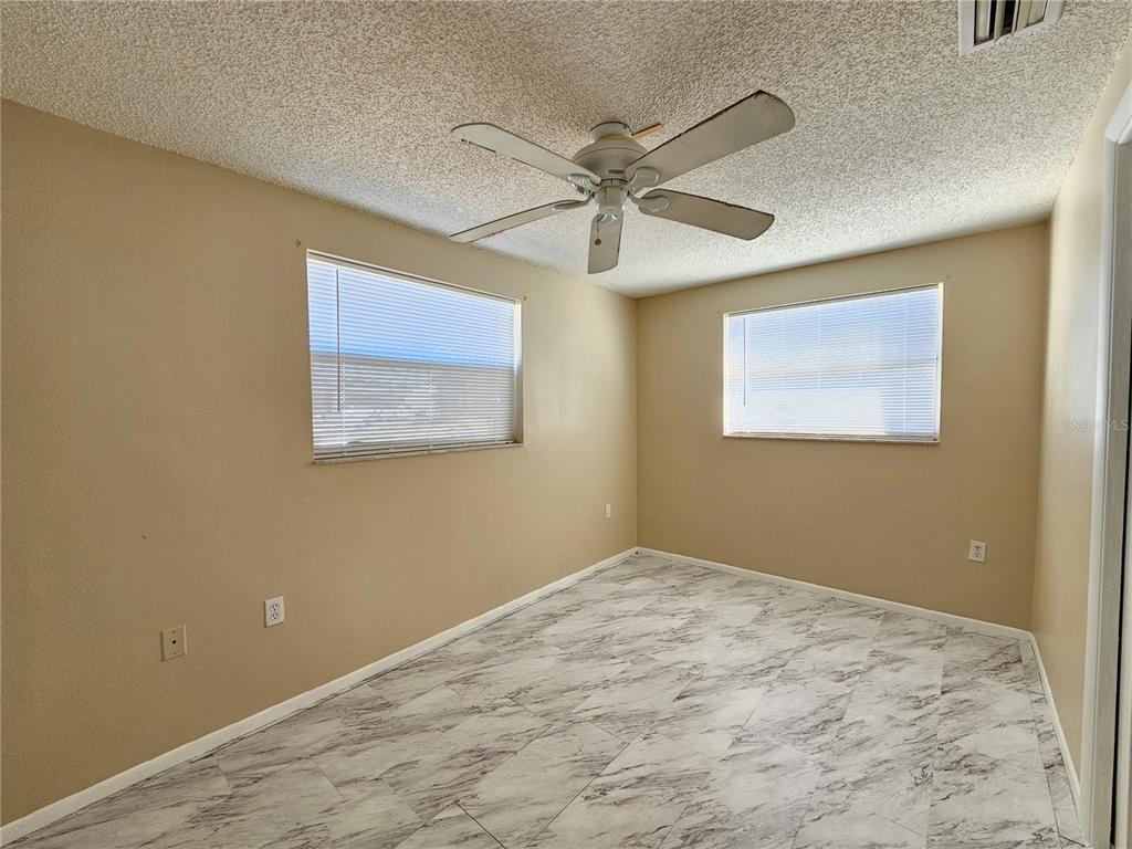 6324 Lomand Avenue New Port Richey, FL 34653 - Photo 9 of 16 a view of an empty room with a window