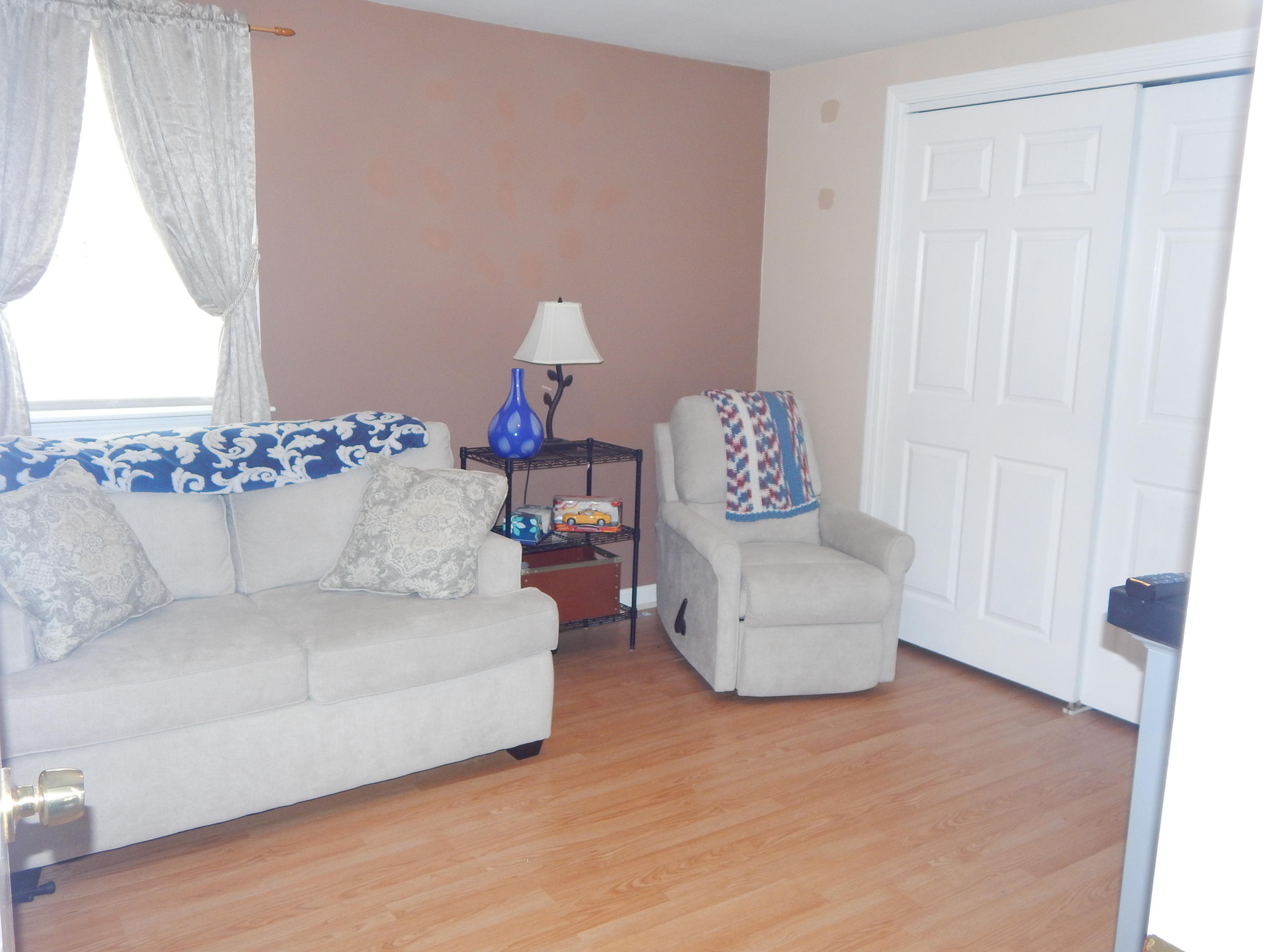 267 Lincoln Road Hyannis, MA 02601 - Photo 17 of 30 a living room with furniture and a window