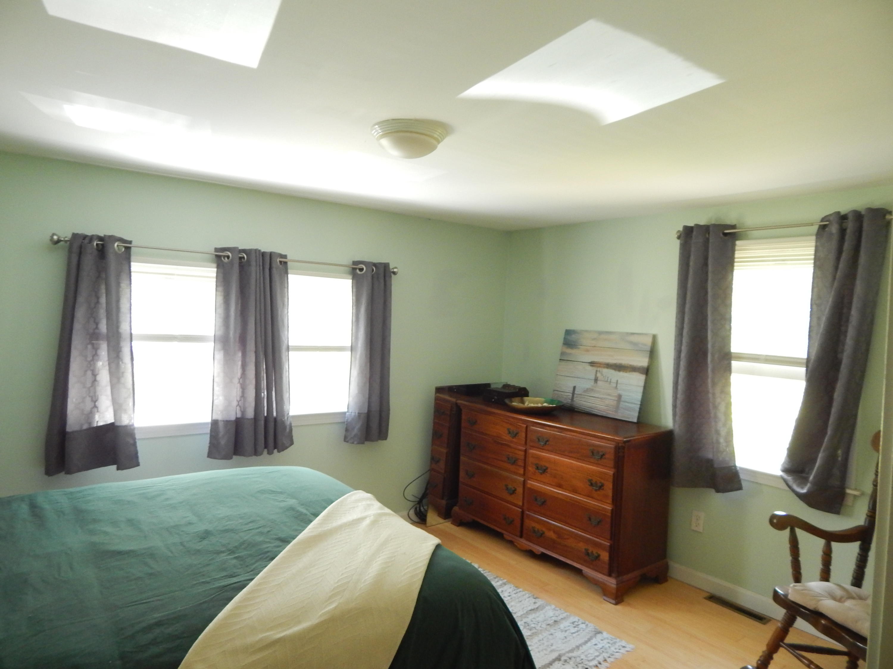 267 Lincoln Road Hyannis, MA 02601 - Photo 22 of 30 a bedroom with a bed and a window