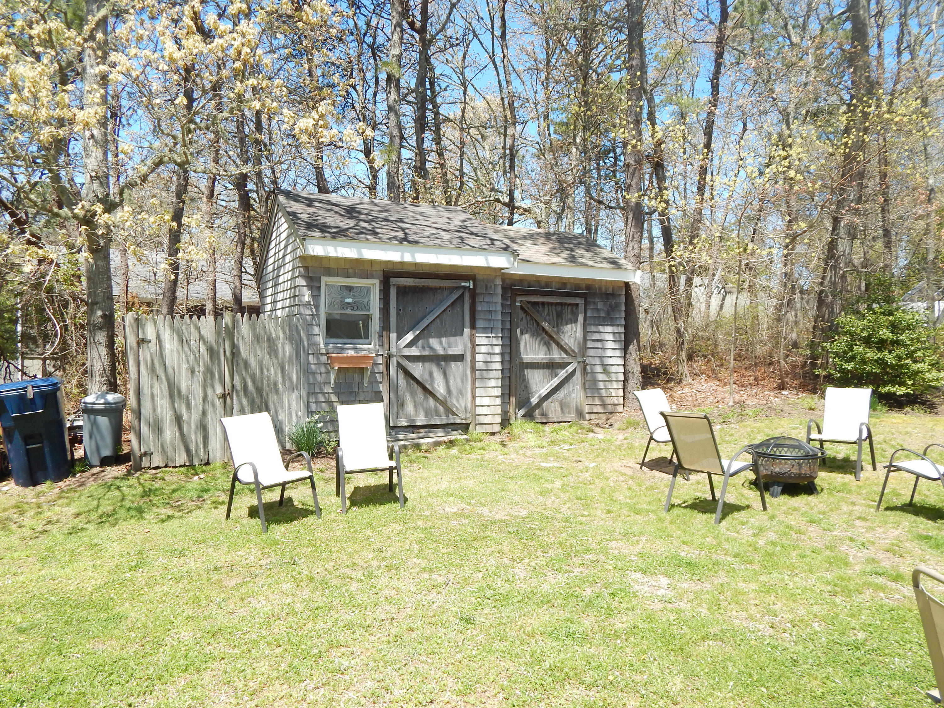 267 Lincoln Road Hyannis, MA 02601 - Photo 5 of 30 a view of backyard of house with seating space