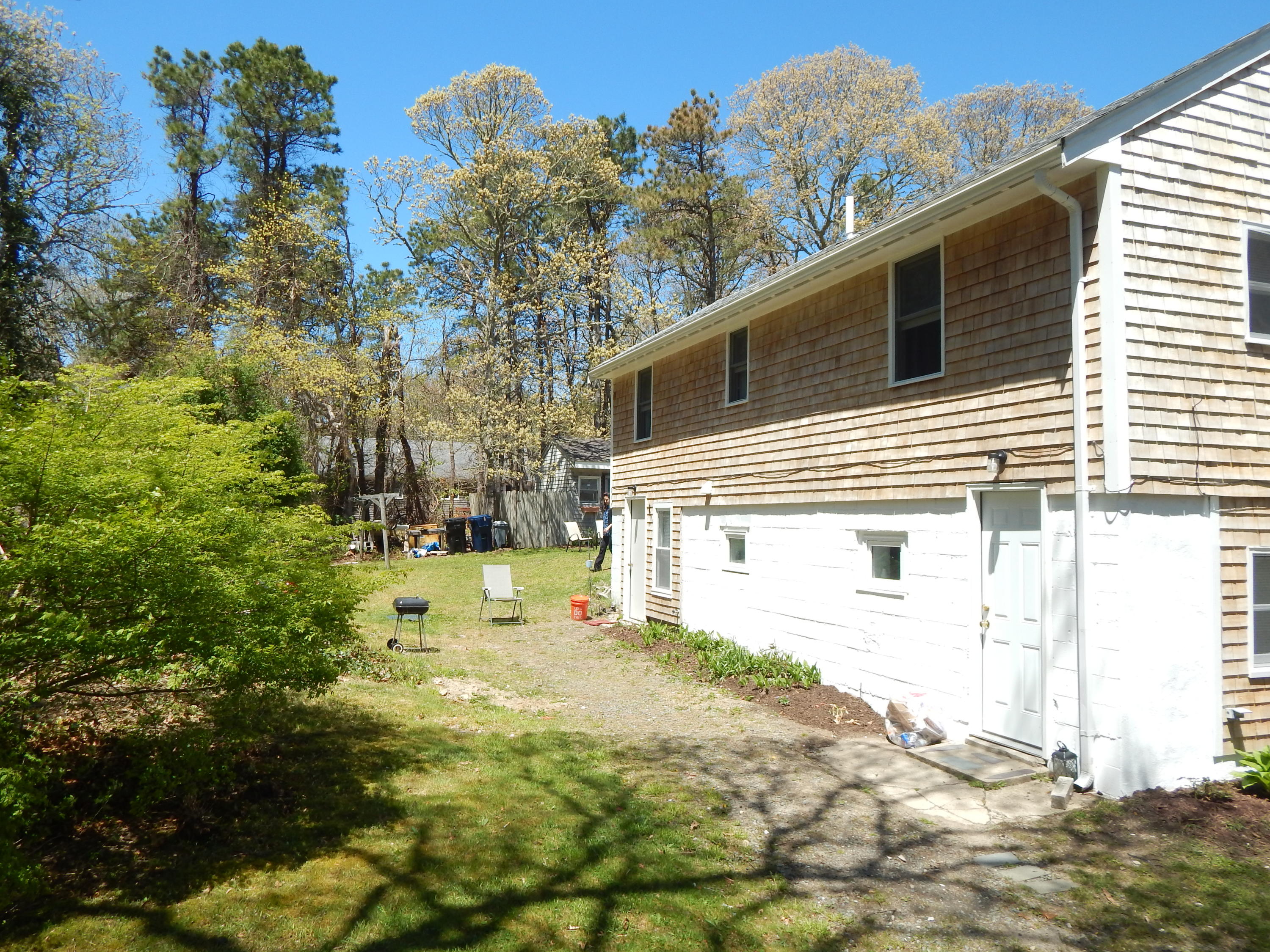 267 Lincoln Road Hyannis, MA 02601 - Photo 7 of 30 a view of a back yard of the house