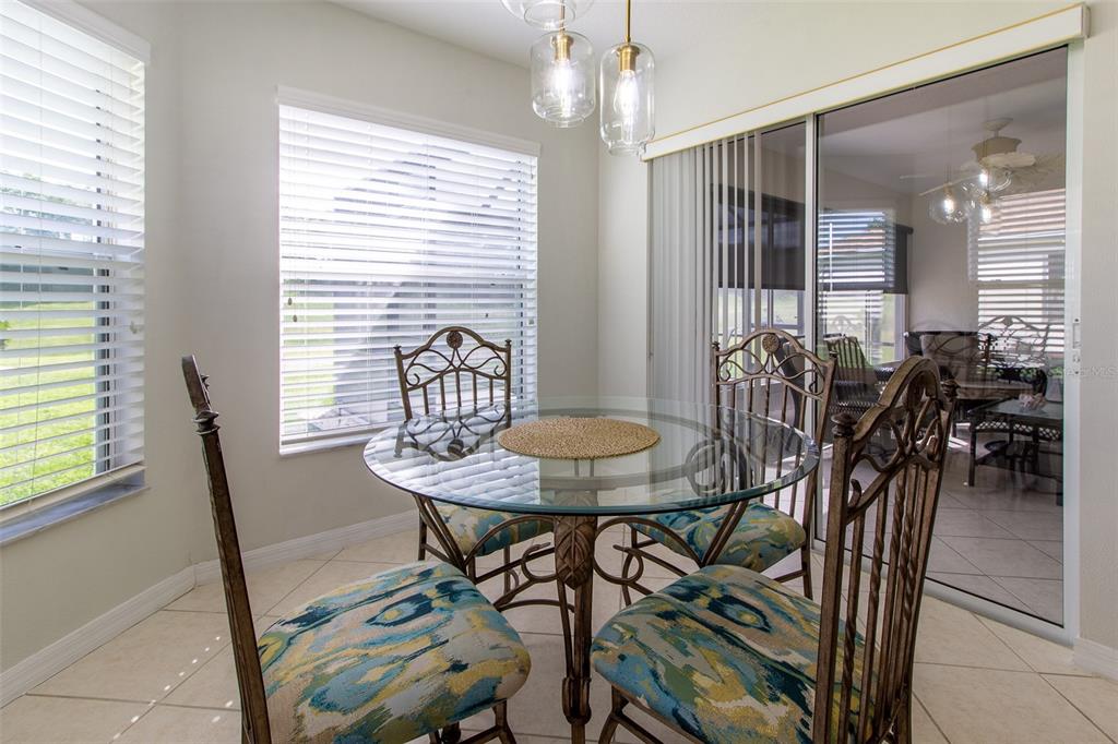 15691 Southwest 11th Court Road Ocala, FL 34473 - Photo 14 of 37 a view of a dining room with furniture and window