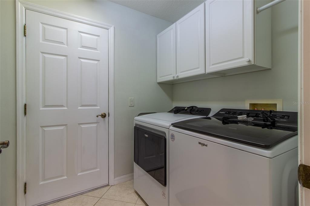 15691 Southwest 11th Court Road Ocala, FL 34473 - Photo 33 of 37 a white stove top oven sitting inside of a kitchen