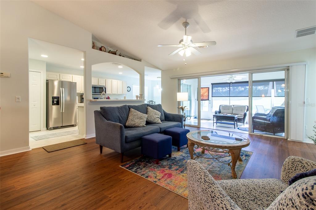 15691 Southwest 11th Court Road Ocala, FL 34473 - Photo 5 of 37 a living room with furniture and a large window