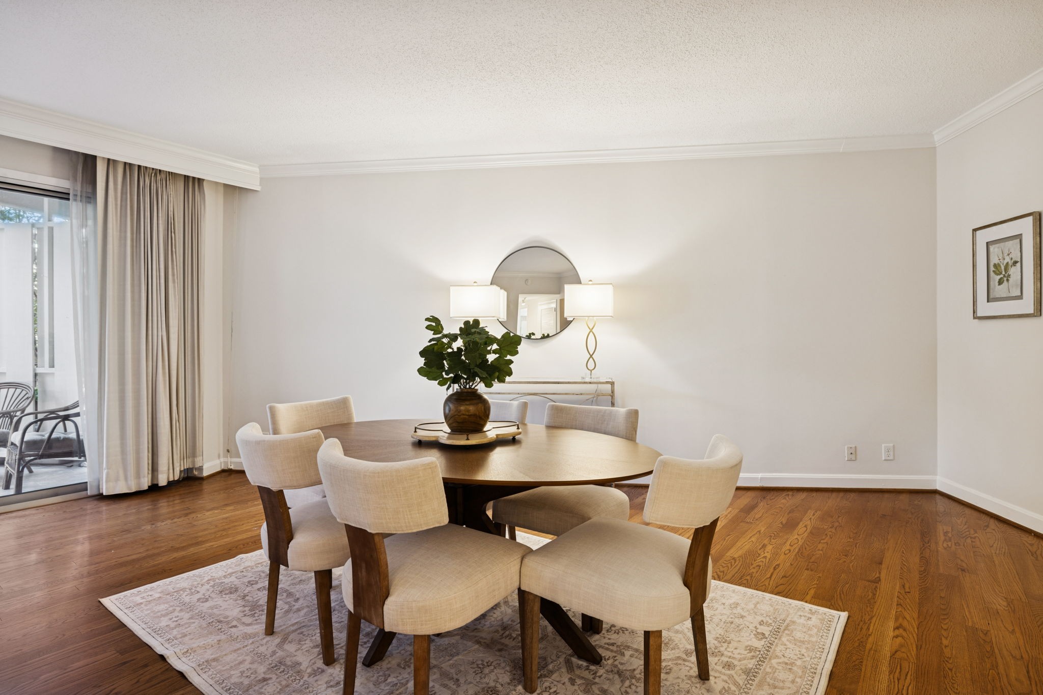 4215 Harding Pike, Unit 204 Nashville, TN 37205 - Photo 13 of 40 a dining room with furniture and wooden floor