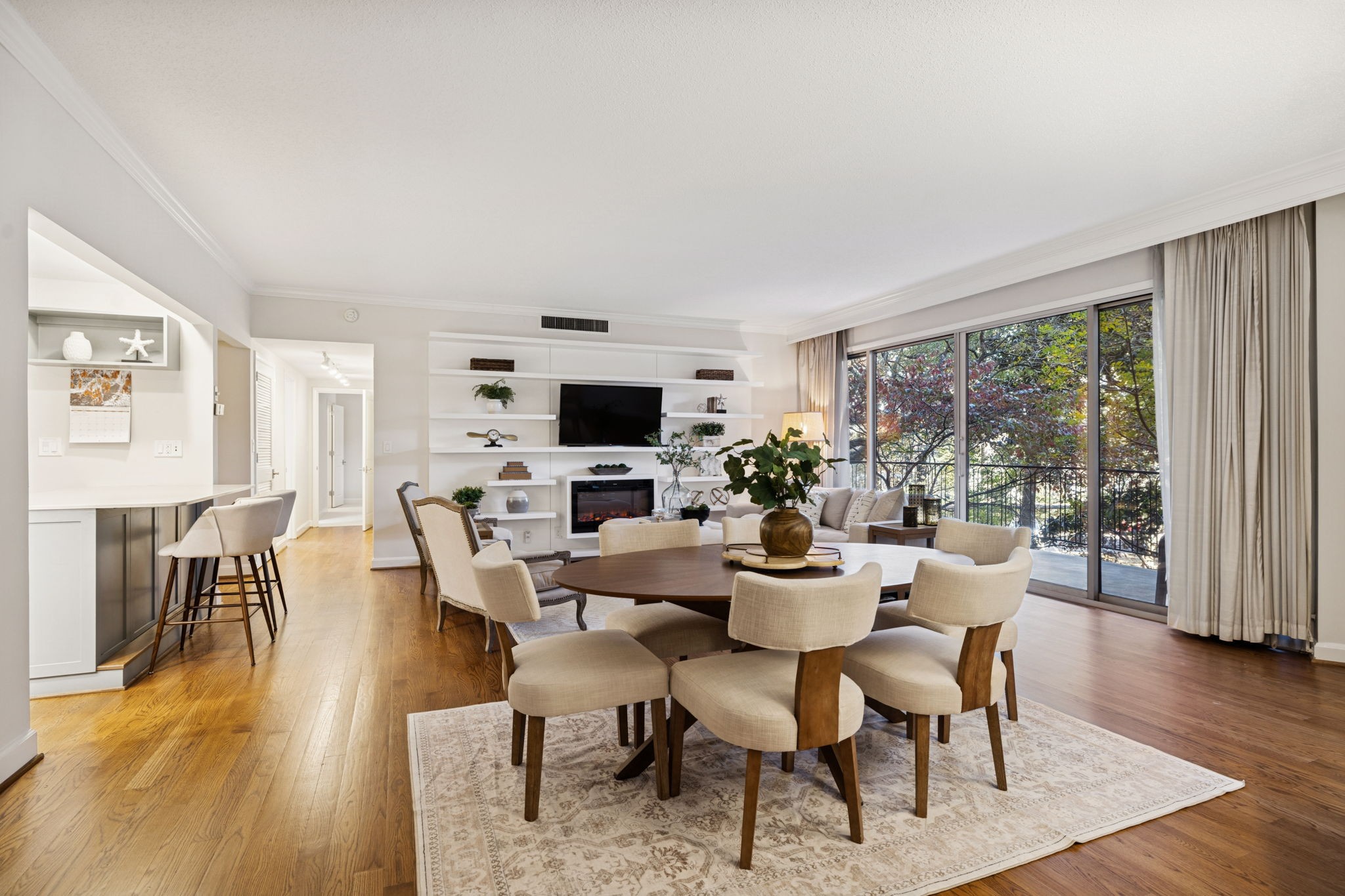 4215 Harding Pike, Unit 204 Nashville, TN 37205 - Photo 14 of 40 a view of a dining room with furniture and wooden floor