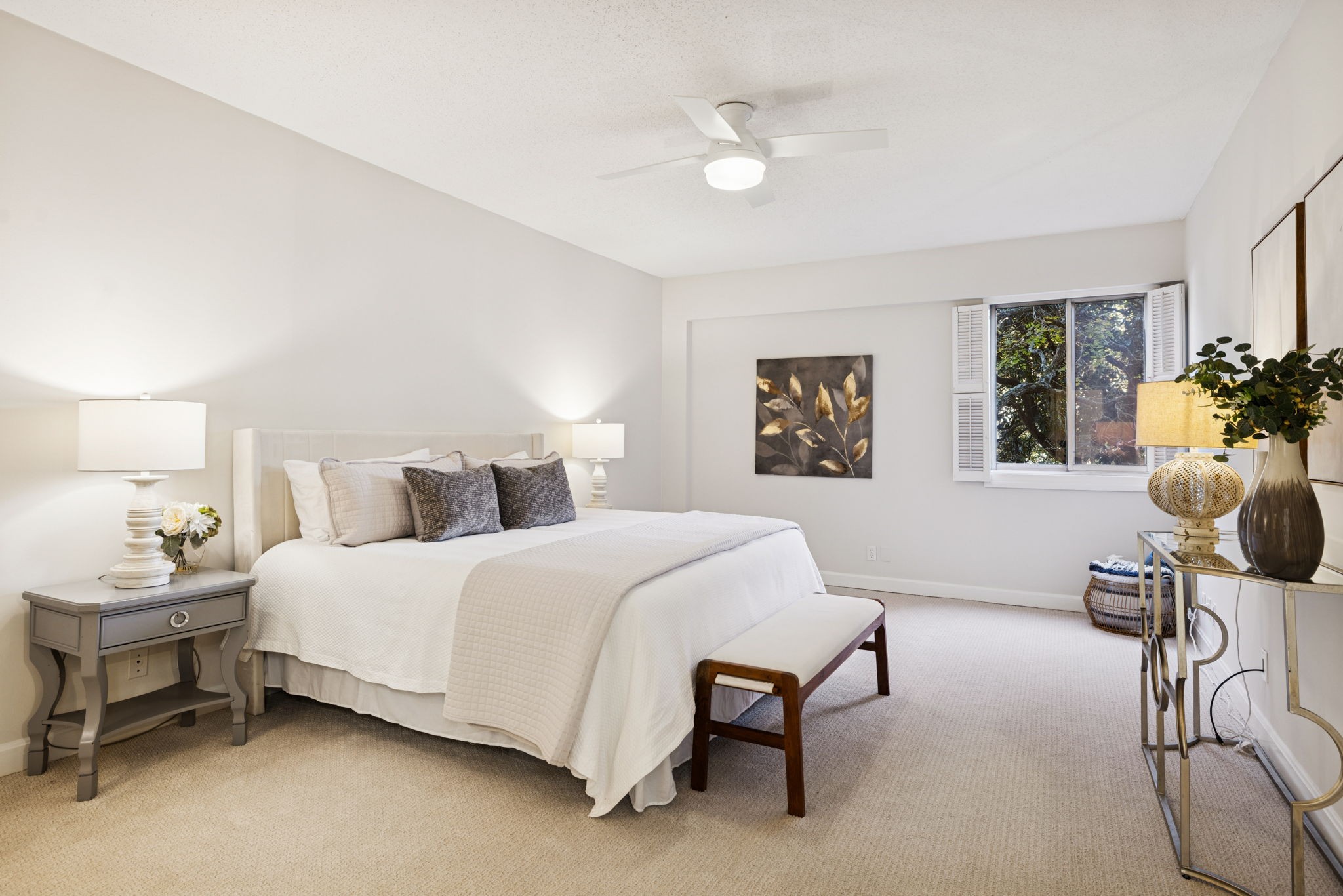 4215 Harding Pike, Unit 204 Nashville, TN 37205 - Photo 20 of 40 a bedroom with a bed and a chandelier