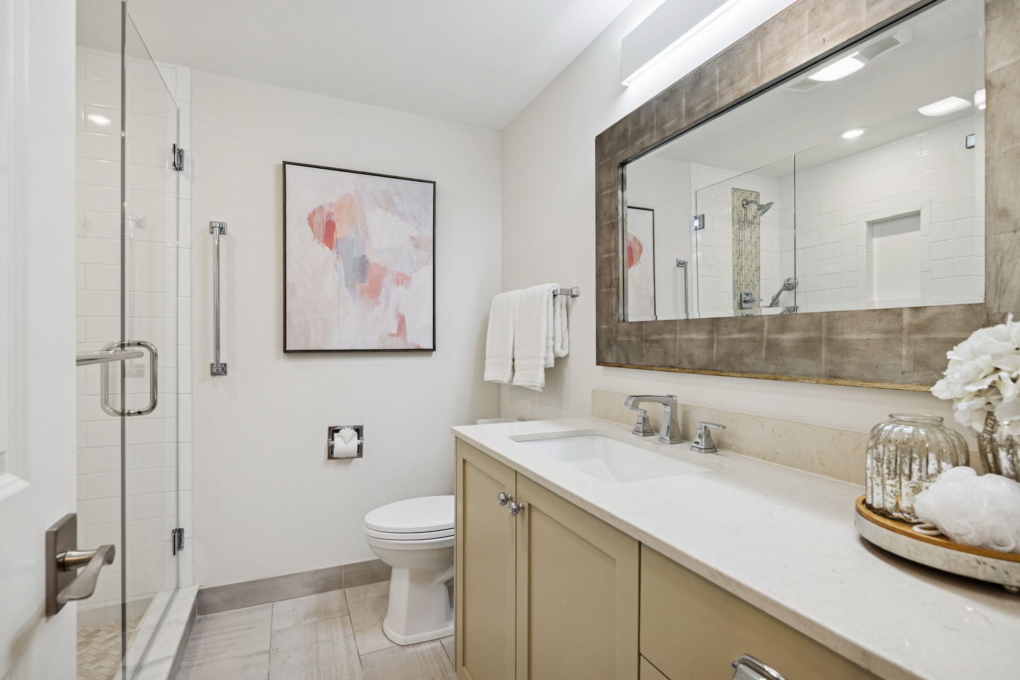 4215 Harding Pike, Unit 204 Nashville, TN 37205 - Photo 29 of 40 a bathroom with a toilet sink and mirror