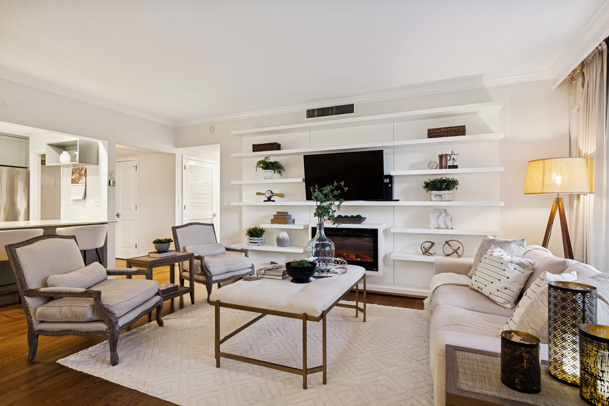 4215 Harding Pike, Unit 204 Nashville, TN 37205 - Photo 7 of 40 a living room with furniture a rug and a fireplace