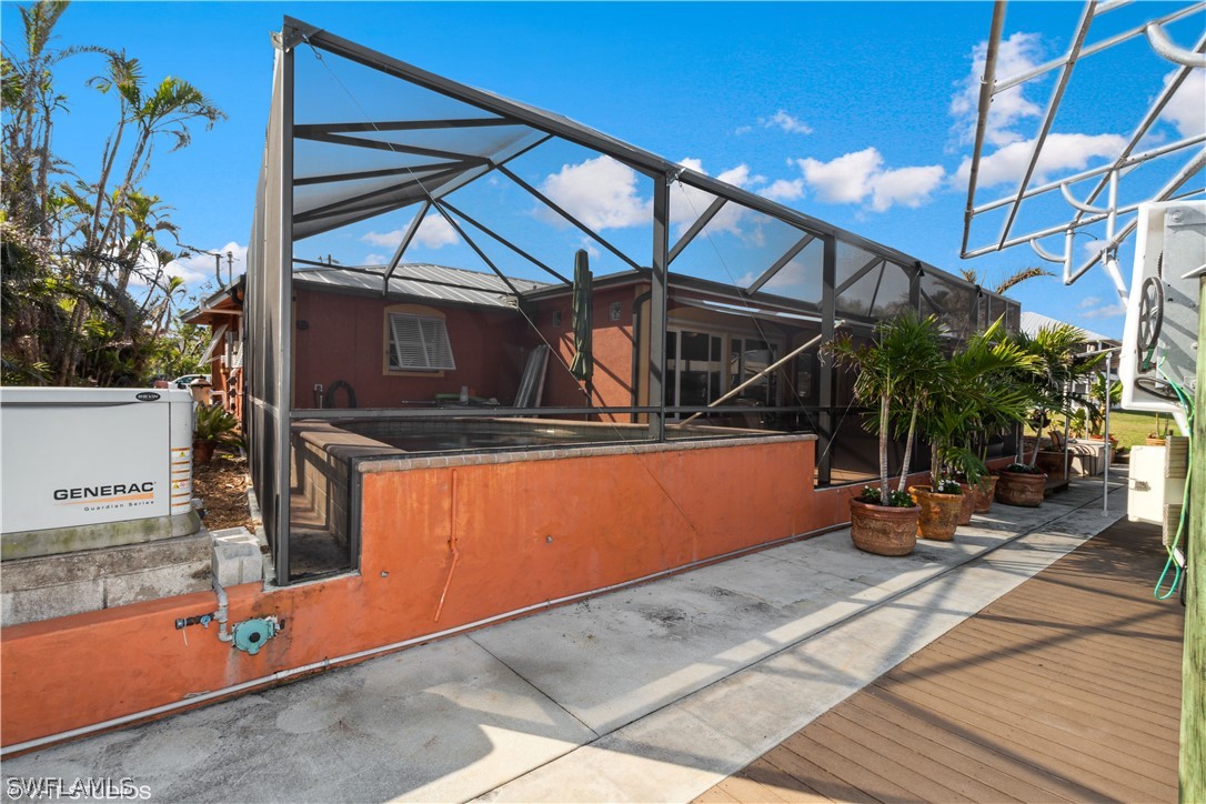 3554 Ruby Avenue St. James City, FL 33956 - Photo 40 of 43 a view of a balcony with chairs