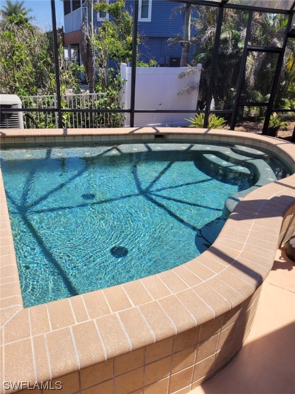 3554 Ruby Avenue St. James City, FL 33956 - Photo 4 of 43 a view of swimming pool from a balcony