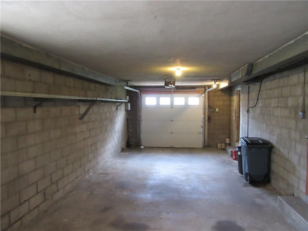 511 Coal Valley Road Jefferson Hills, PA 15025 - Photo 21 of 25 Size of the garage is tremendous. Step up level at the back of the garage is a great space for a workbench area.