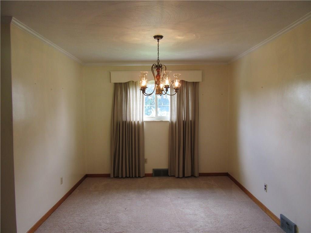 511 Coal Valley Road Jefferson Hills, PA 15025 - Photo 5 of 25 Formal dining room with crown molding.