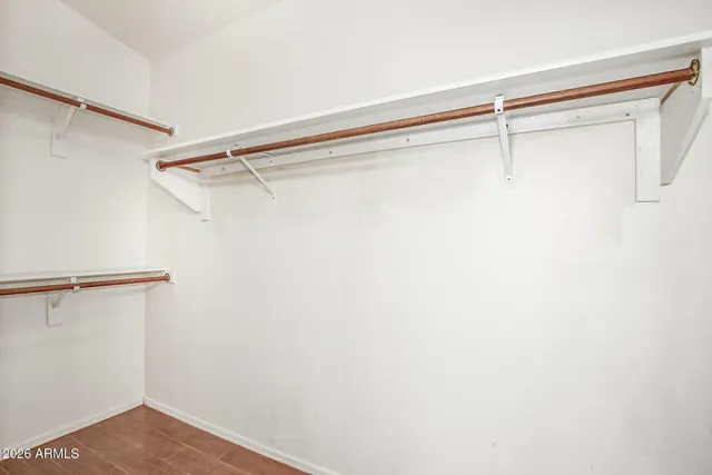 a view of a room with racks on the wall