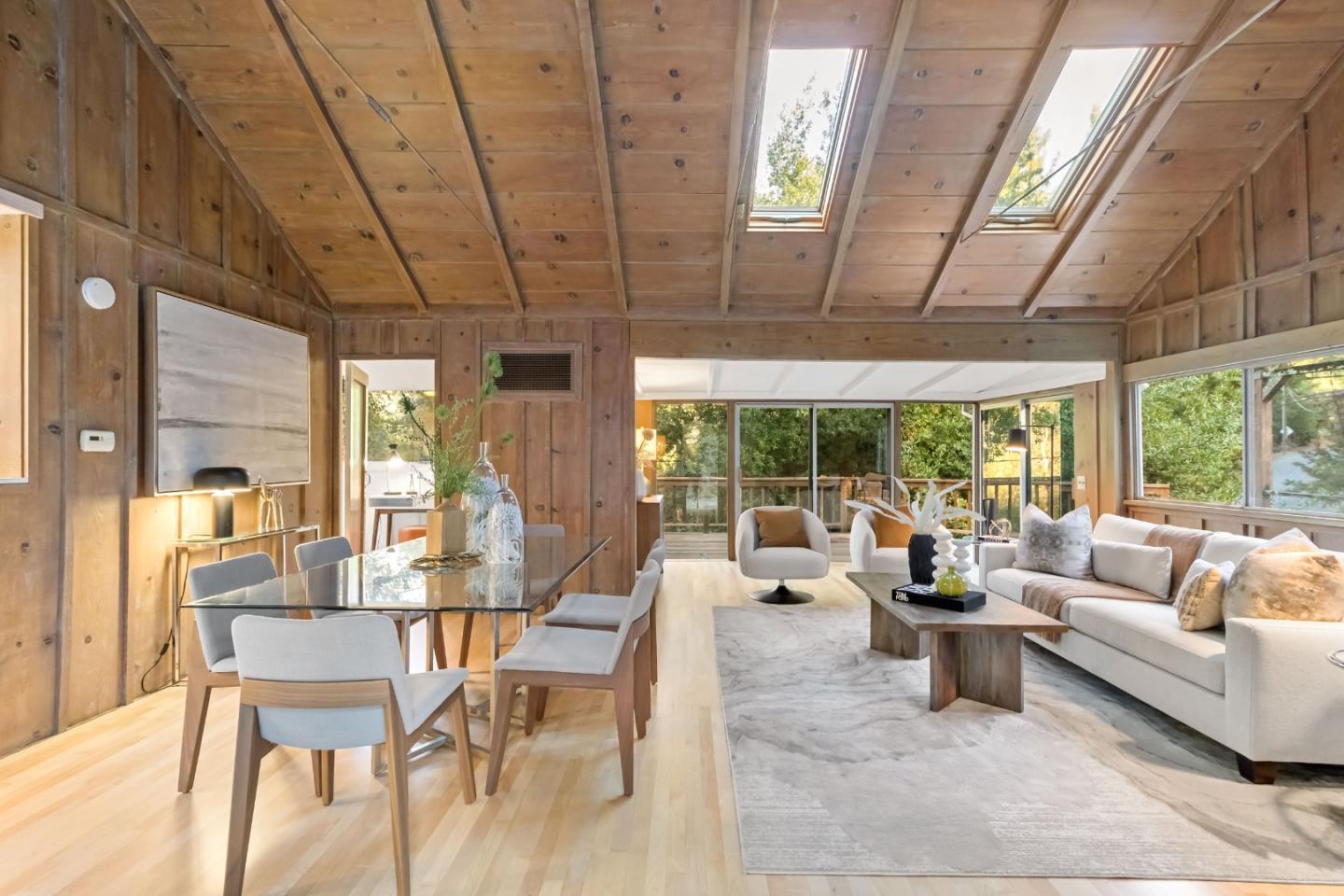 1019 Los Trancos Road Portola Valley, CA 94028 - Photo 12 of 63 a living room with furniture and a large window