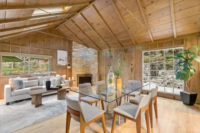 a kitchen with stainless steel appliances granite countertop a sink a stove and cabinets