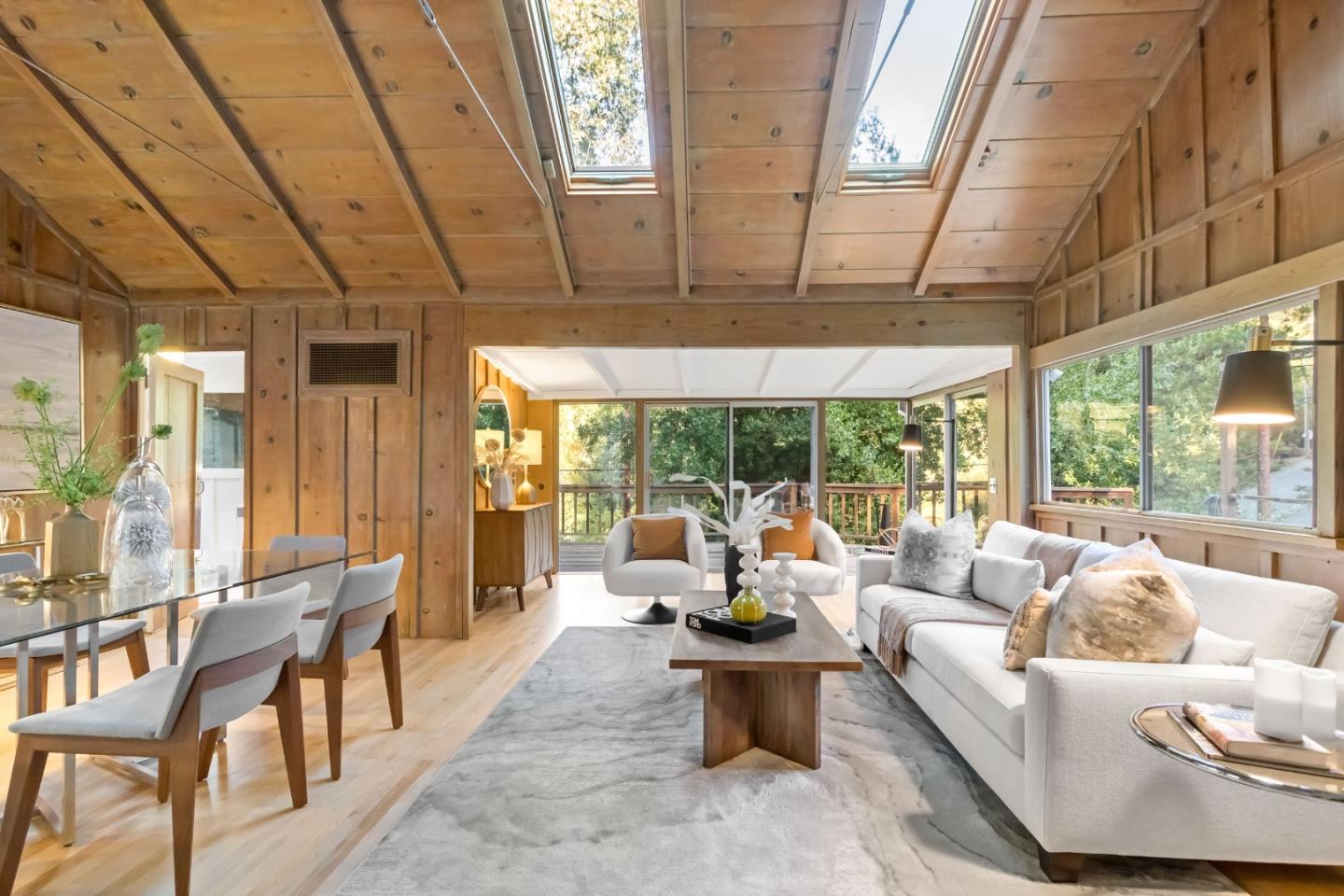 1019 Los Trancos Road Portola Valley, CA 94028 - Photo 19 of 63 a living room with furniture and a large window