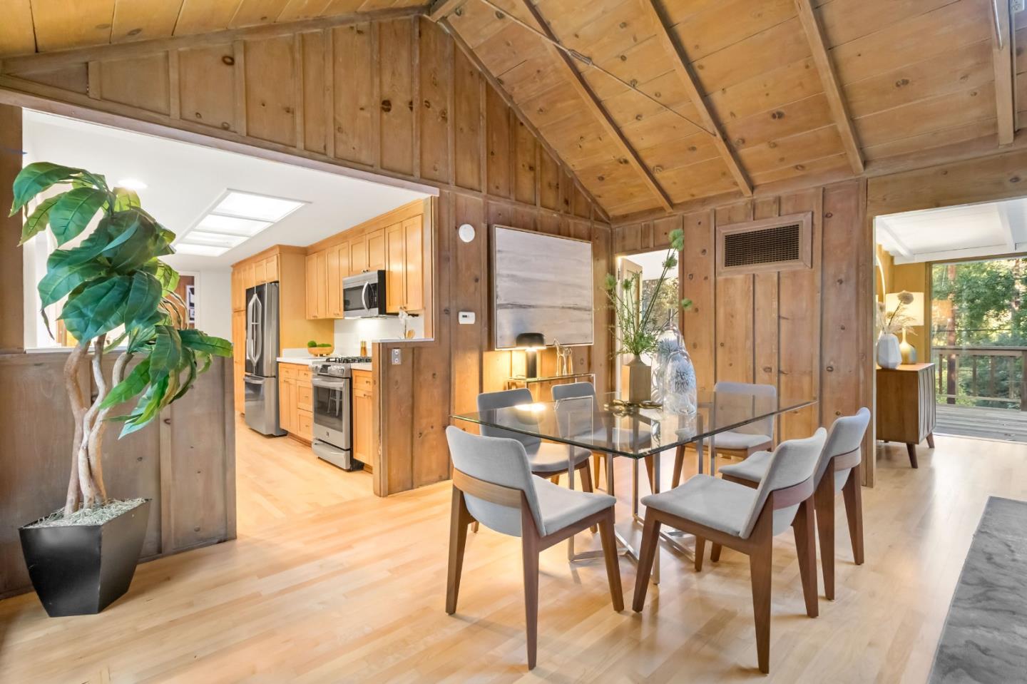 1019 Los Trancos Road Portola Valley, CA 94028 - Photo 20 of 63 a dining room with furniture and wooden floor