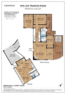 a front view of a house with a yard and a garage