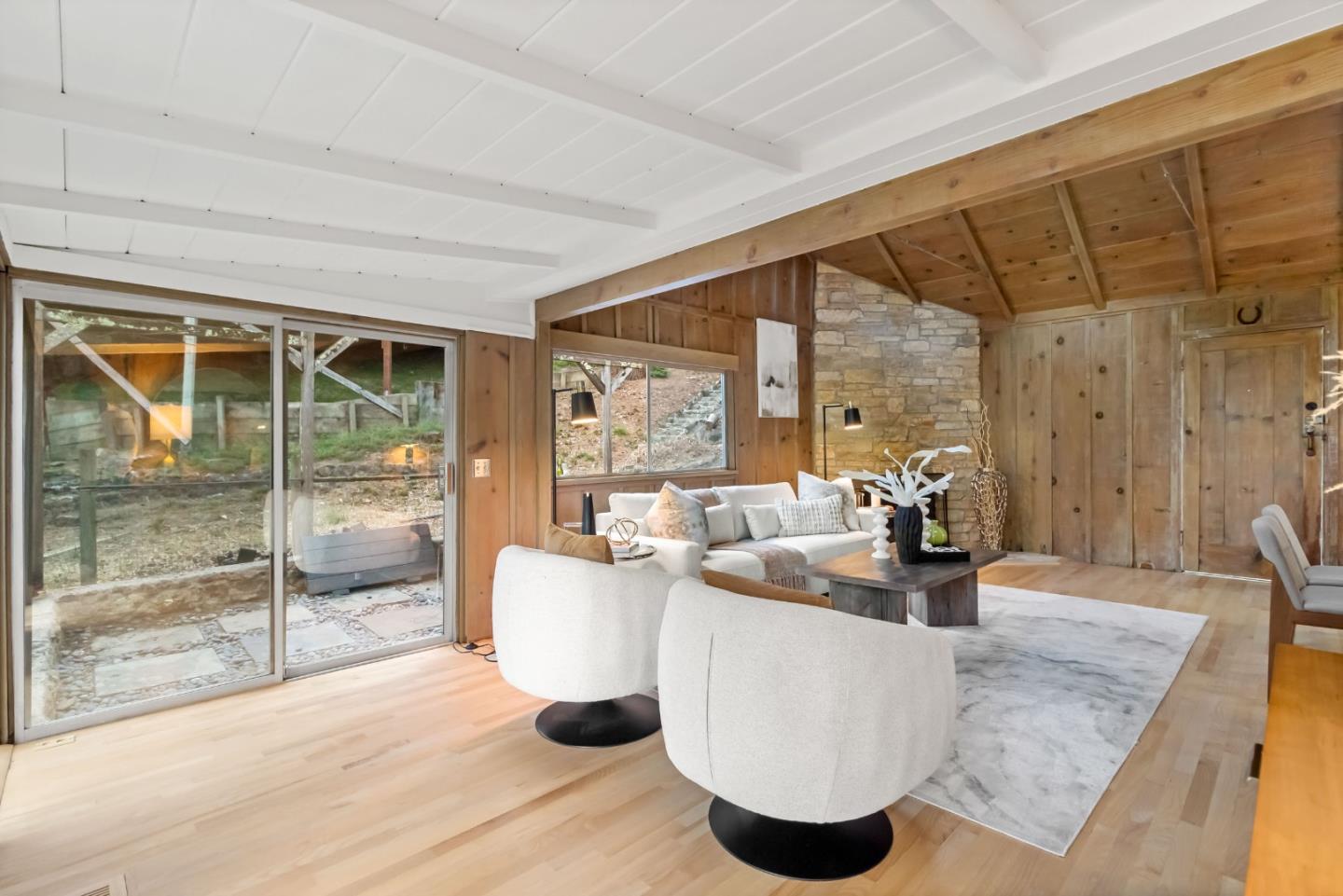 1019 Los Trancos Road Portola Valley, CA 94028 - Photo 21 of 63 a living room with large windows