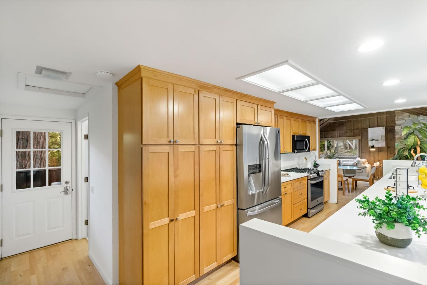 1019 Los Trancos Road Portola Valley, CA 94028 - Photo 27 of 63 a kitchen with stainless steel appliances granite countertop a refrigerator and a sink