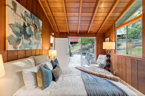 a front view of a house with a garage