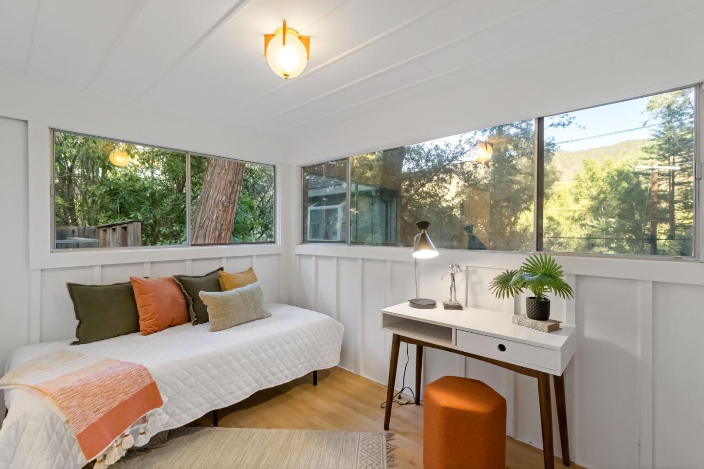 1019 Los Trancos Road Portola Valley, CA 94028 - Photo 36 of 63 a bedroom with a bed and a large window