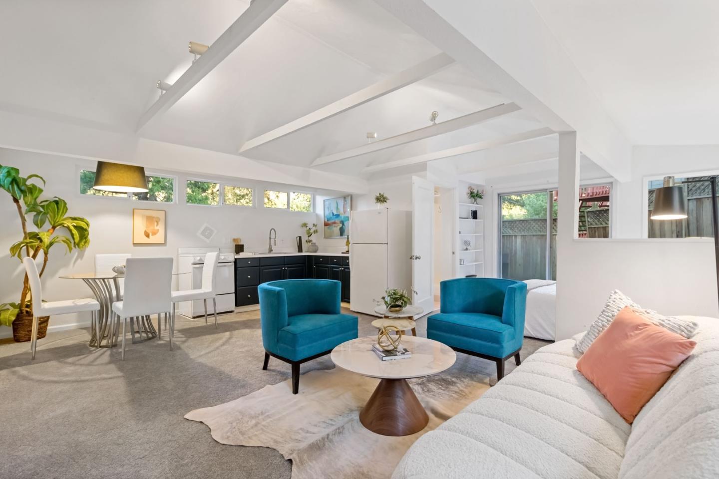 1019 Los Trancos Road Portola Valley, CA 94028 - Photo 43 of 63 a living room with furniture and a large window