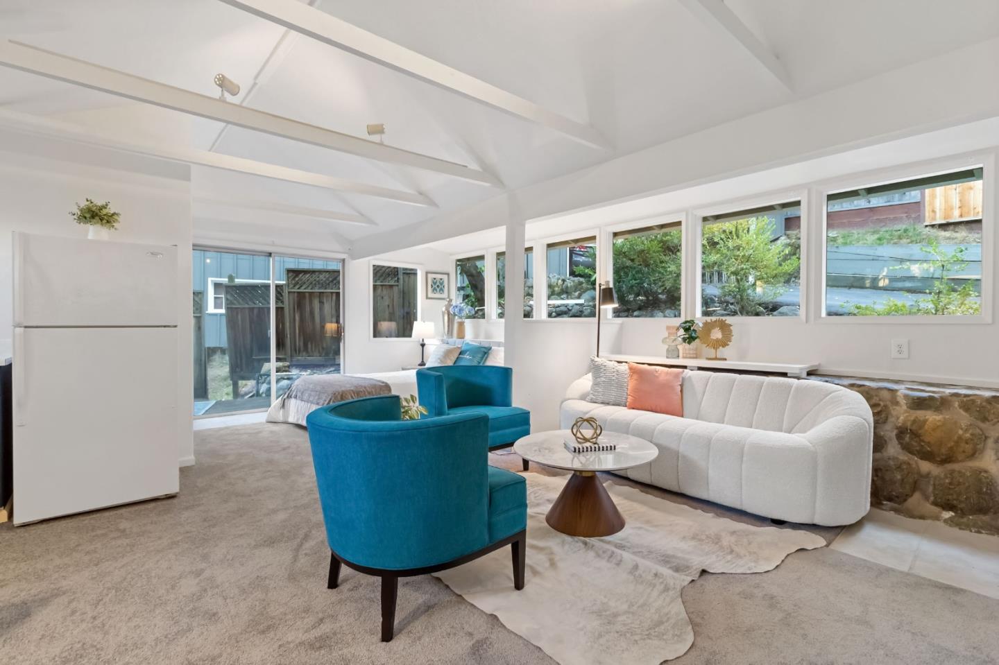 1019 Los Trancos Road Portola Valley, CA 94028 - Photo 45 of 63 a living room with furniture and a large window