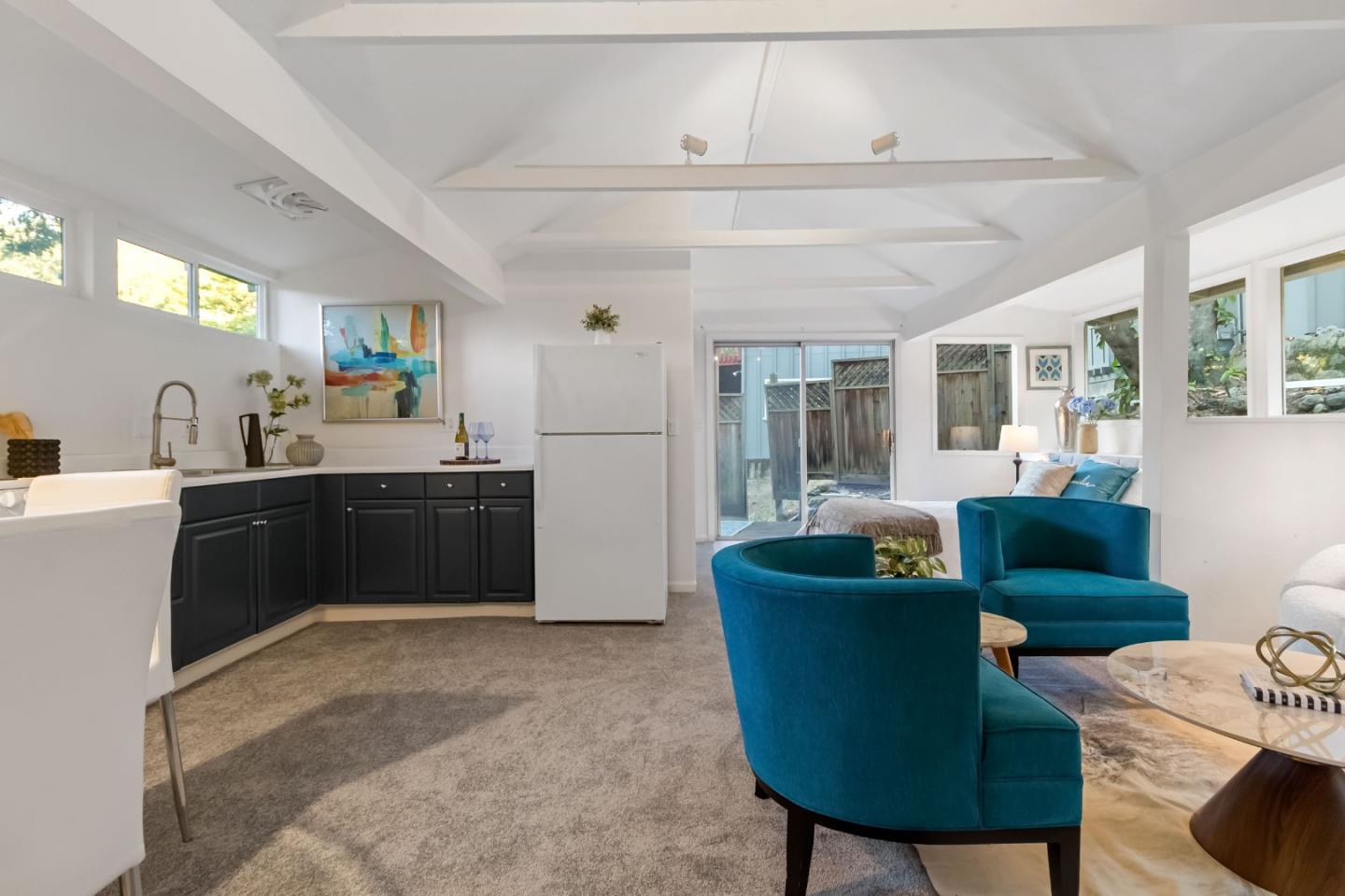 1019 Los Trancos Road Portola Valley, CA 94028 - Photo 46 of 63 a living room with furniture and a large window