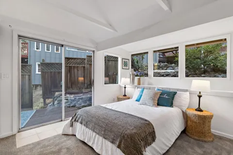 an aerial view of a house with outdoor space