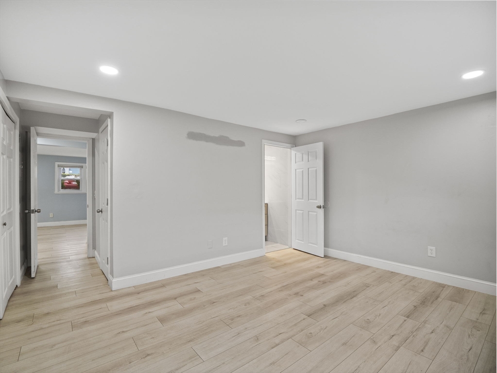 24 Bettys Pond Road, Unit K Barnstable, MA 02601 - Photo 36 of 40 a view of livingroom with wooden floor