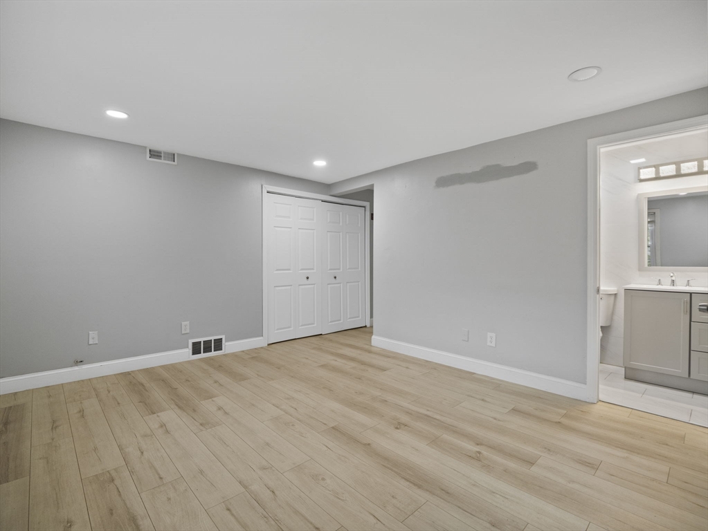 24 Bettys Pond Road, Unit K Barnstable, MA 02601 - Photo 37 of 40 a view of an empty room