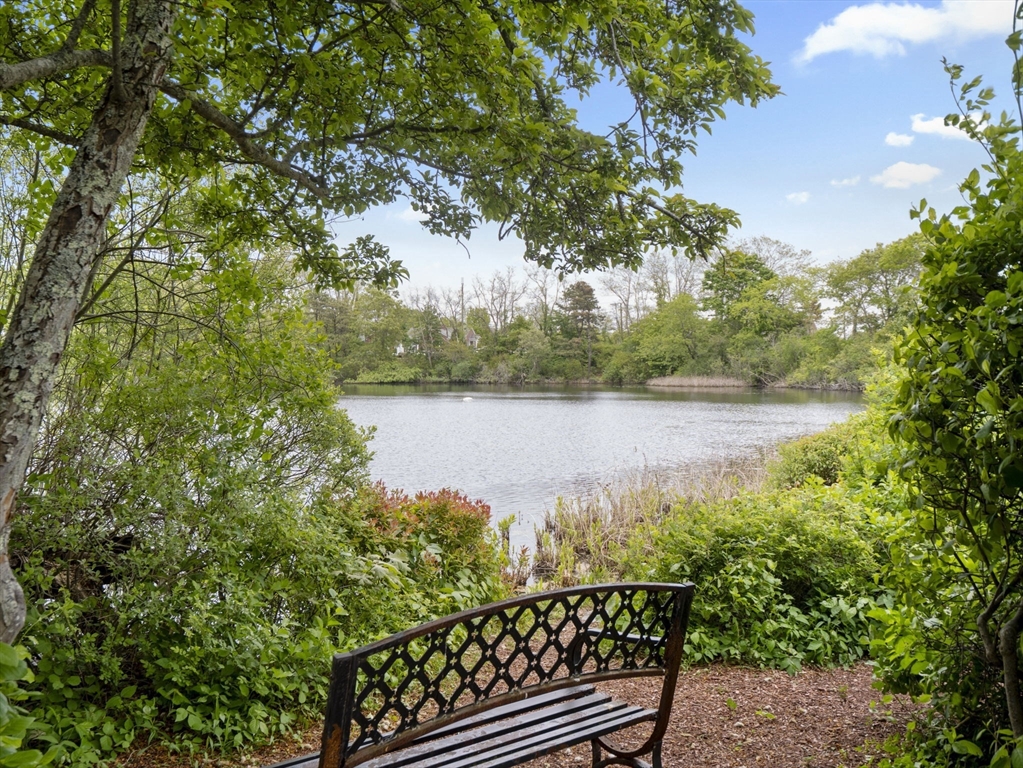24 Bettys Pond Road, Unit K Barnstable, MA 02601 - Photo 10 of 40 a view of a lake from a balcony