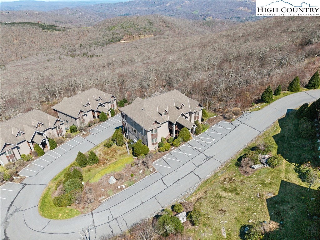 143 Wildflower Ridge, Unit 17D Sugar Mountain, NC 28604 - Photo 34 of 36 an aerial view of a house with a swimming pool
