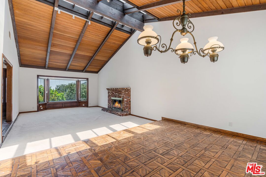 1181 Somera Road Los Angeles, CA 90077 - Photo 5 of 40 a view of a room with wooden floor