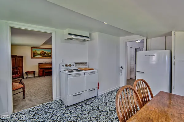 a bedroom with a bed and a cabinets