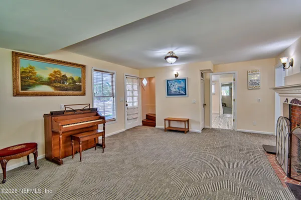 a view of a livingroom with furniture and a couch