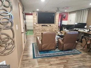 a room with furniture and a rug