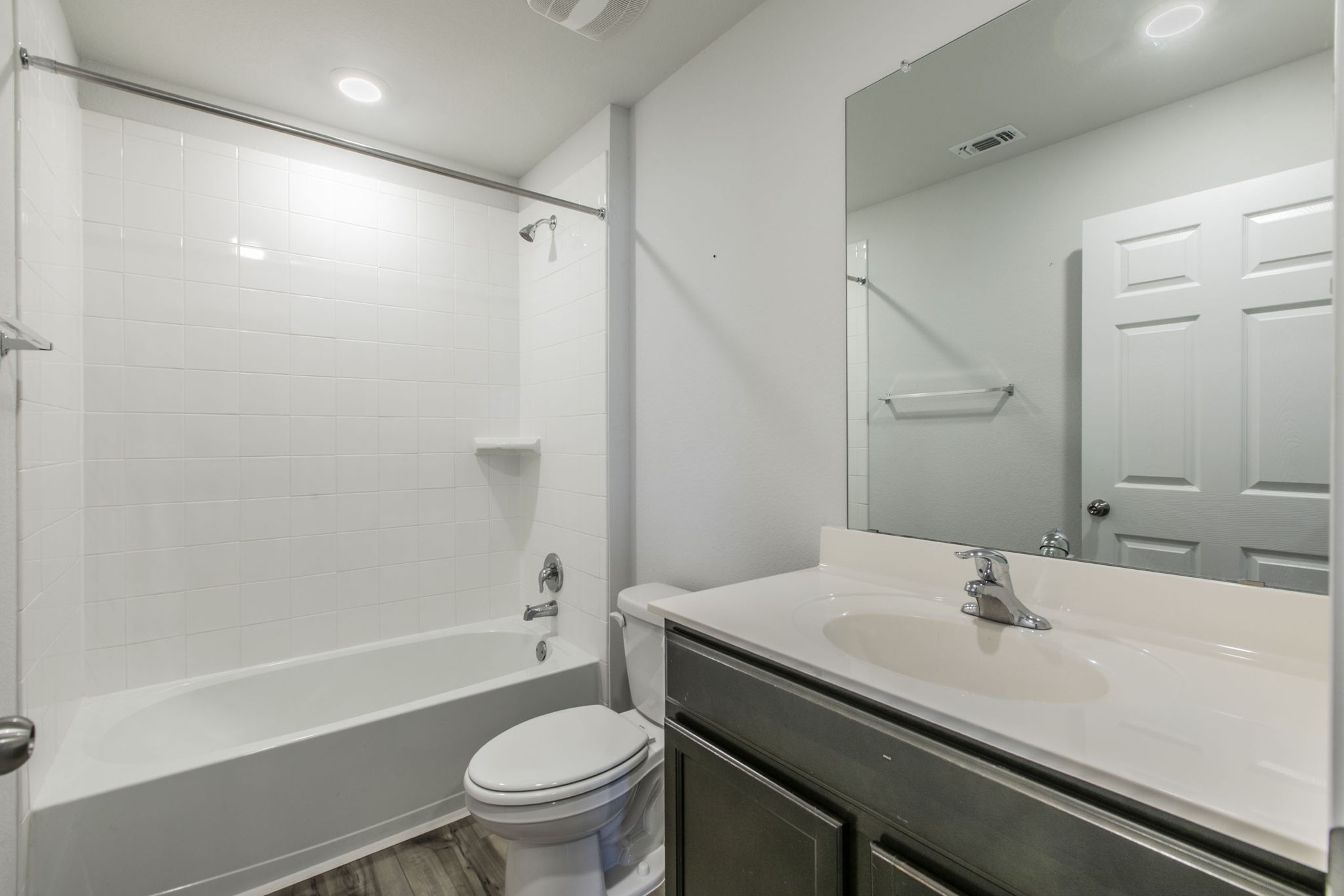 237 Poplin Lane Troy, TX 76579 - Photo 17 of 23 a bathroom with a sink a toilet and a mirror