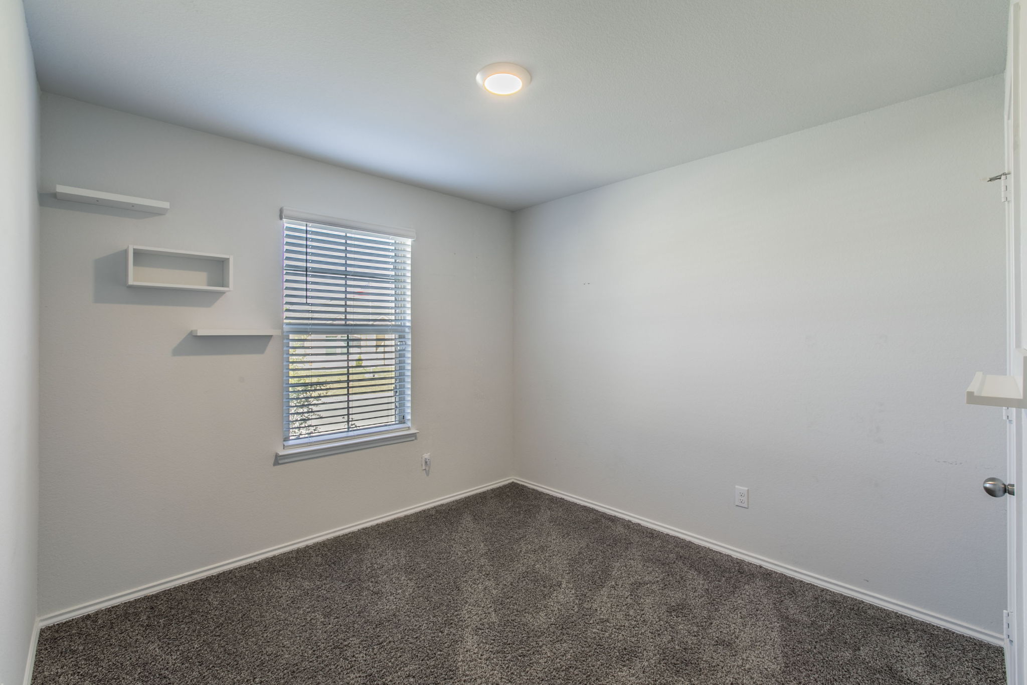237 Poplin Lane Troy, TX 76579 - Photo 18 of 23 an empty room with windows