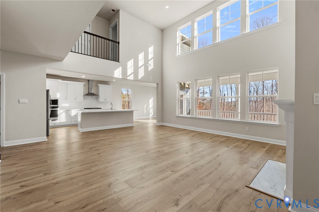 2710 Maidens Road Powhatan, VA 23139 - Photo 17 of 33 a view of kitchen with furniture and wooden floor
