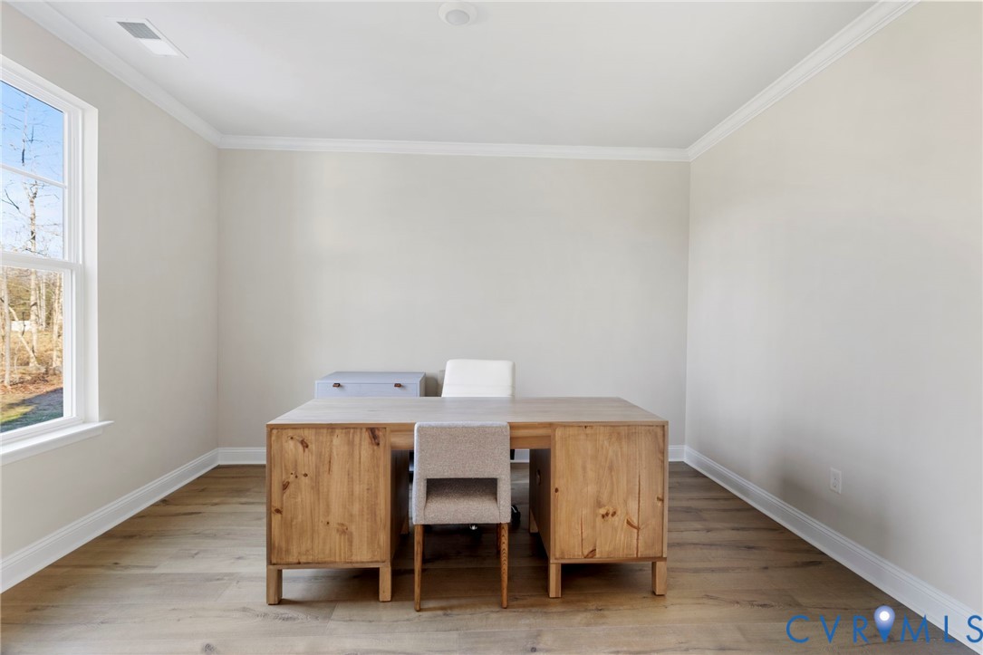 2710 Maidens Road Powhatan, VA 23139 - Photo 3 of 33 a view of a room with a table and chairs