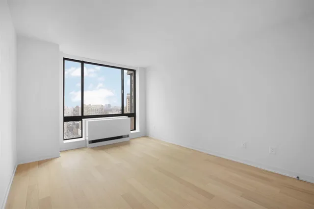 a kitchen with a sink and a refrigerator