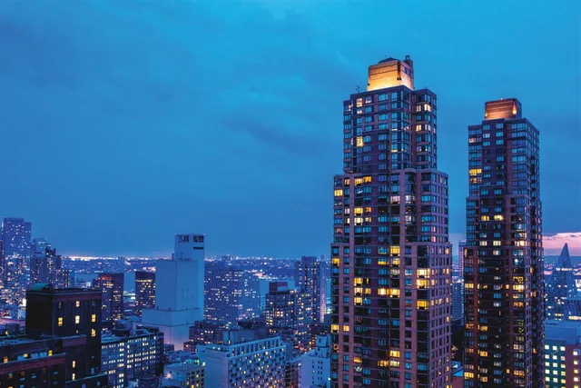 a dining room with a table and chairs